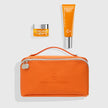Set Vitamina C con emulsión de 50 ml, contorno de ojos de 15 ml y neceser naranja